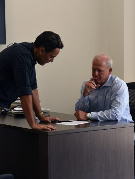 Vital Data Technology employees in the office.